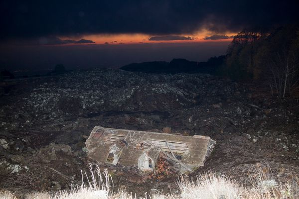 © Gaia Squarci. A house submerged by lava is seen on mount Etna, Sicily. 2015