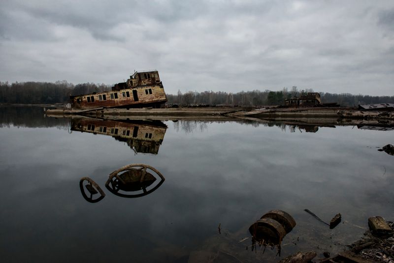 © Pierpaolo Mittica - Sunk ships in the Chernobyl river port. Chernobyl Exclusion Zone.