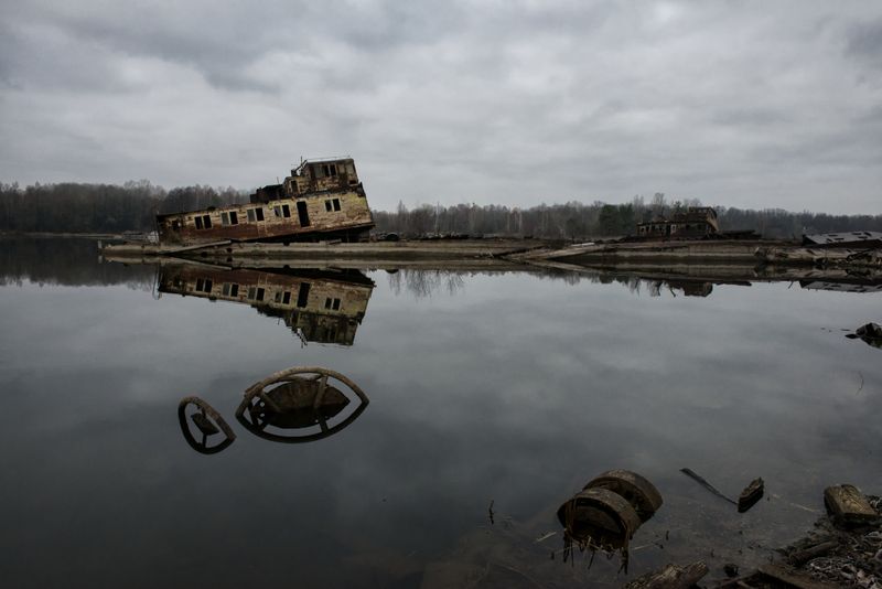 © Pierpaolo Mittica - Sunk ships in the Chernobyl river port. Chernobyl Exclusion Zone.
