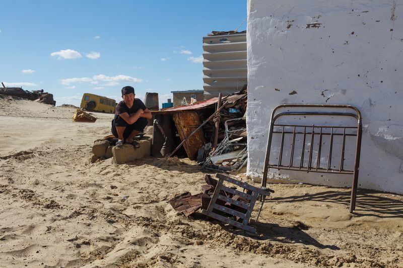 © Iulia Galushina - Akespe village where sand covered up the houses and "drowned" fishermen’s homes. Kazakhstan.