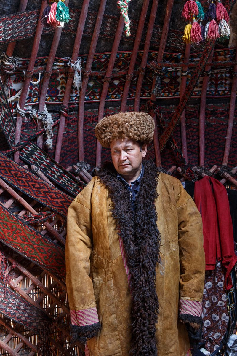 © Iulia Galushina - A man from Karakalpastan is posing for tourists in traditional national clothes. Moynaq city, Uzbekistan.