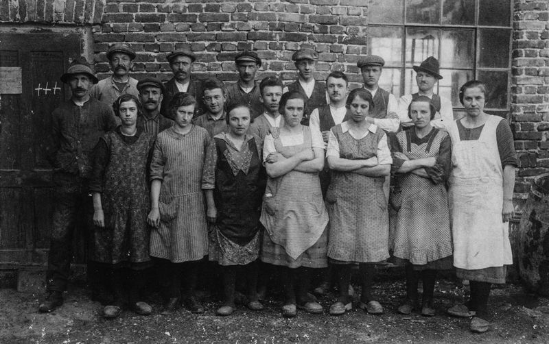 © max.korndoerfer - Factory workers from a century ago.