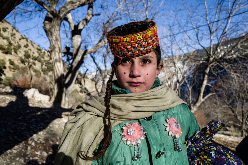 © Sarah Caron - Shandana, likes the flowers as a symbol, as most girls being attached to nature, wear them embroidered on their dresses.