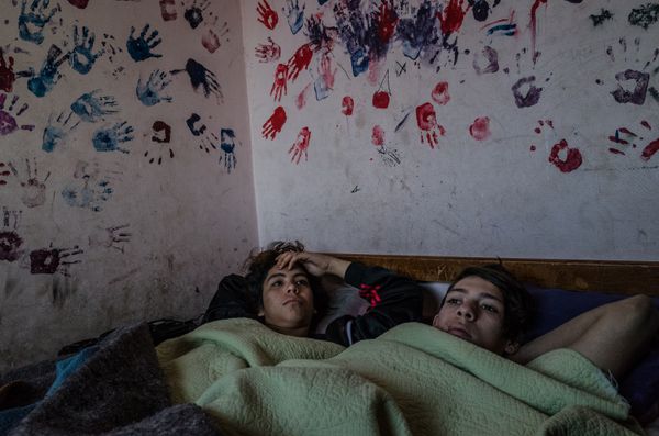 © Karl Mancini - Buenos Aires, Isla Maciel. F. and K. in a cold early winter morning in her room.