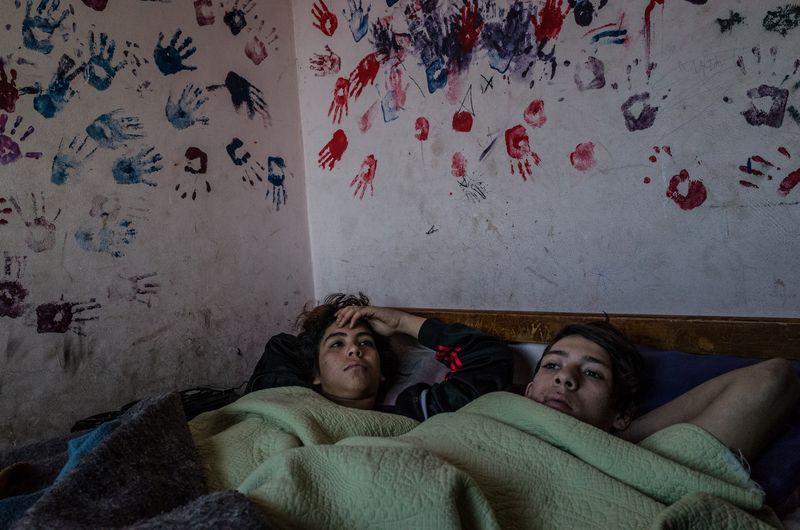 © Karl Mancini - Buenos Aires, Isla Maciel. F. and K. in a cold early winter morning in her room.