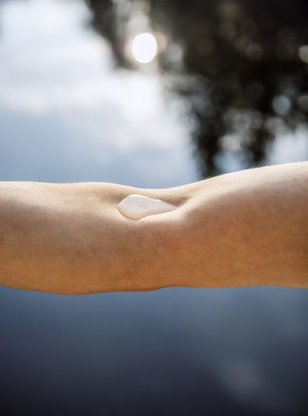 © Leafy Yun Ye - A water droplet rests on an arm by the lake, Los Angeles, 2022.