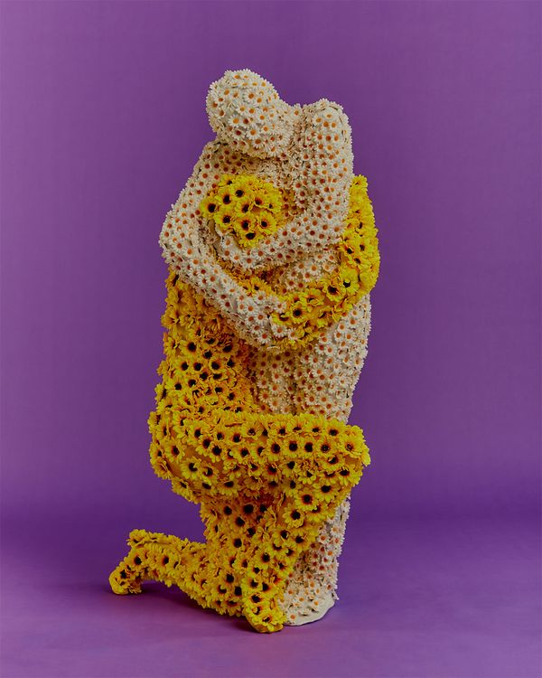 © Victoria Ruiz - La Resistencia. Two 'Flower Skin' civilians side by side holding on to hope and each other.