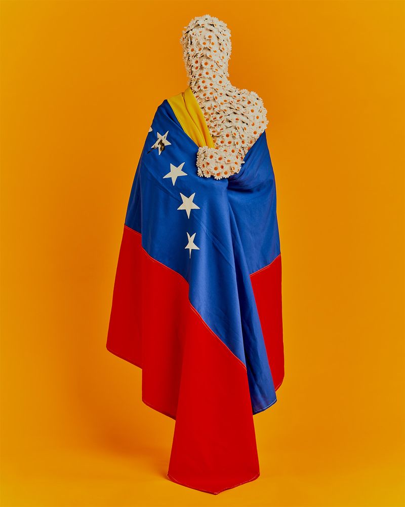 © Victoria Ruiz - Mi Bandera. My 'Flower Skin' wearing the Venezuelan flag representing life in a place of death.