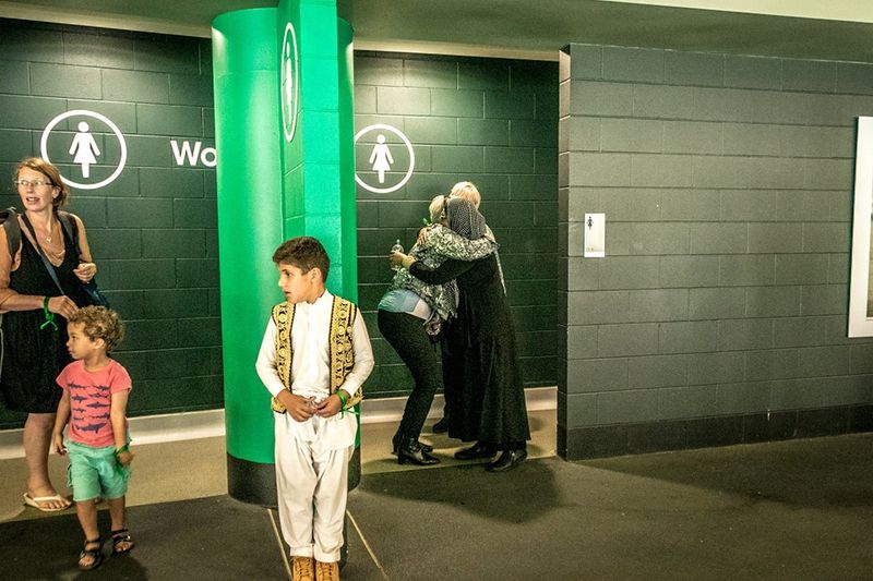 © Serena Stevenson - Strangers embrace.