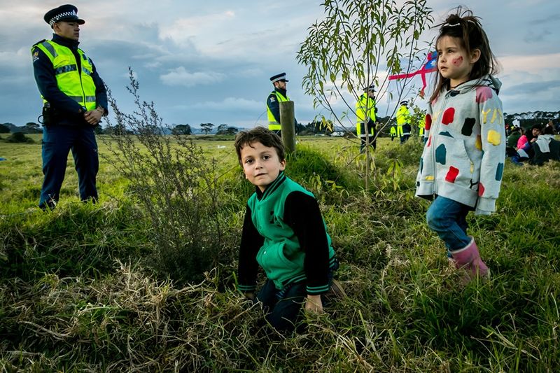 © Serena Stevenson - Two young 6 year olds bless the land as they plant trees.