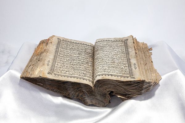 © András Polgár - 01. Al-Quran has been found after the disaster and conserved in Banda Aceh city's Tsunami Museum.