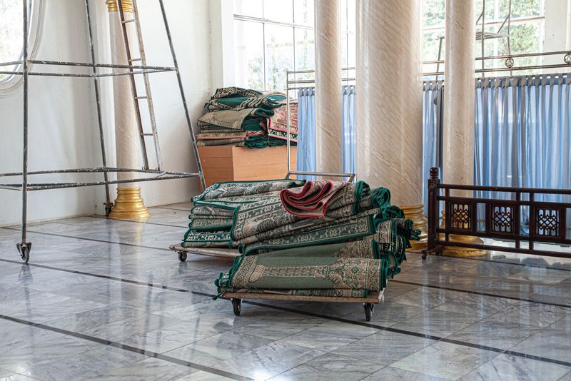 © András Polgár - 12. Rolled up sajadas (prayer rugs) in the Rahmatullah Mosque.