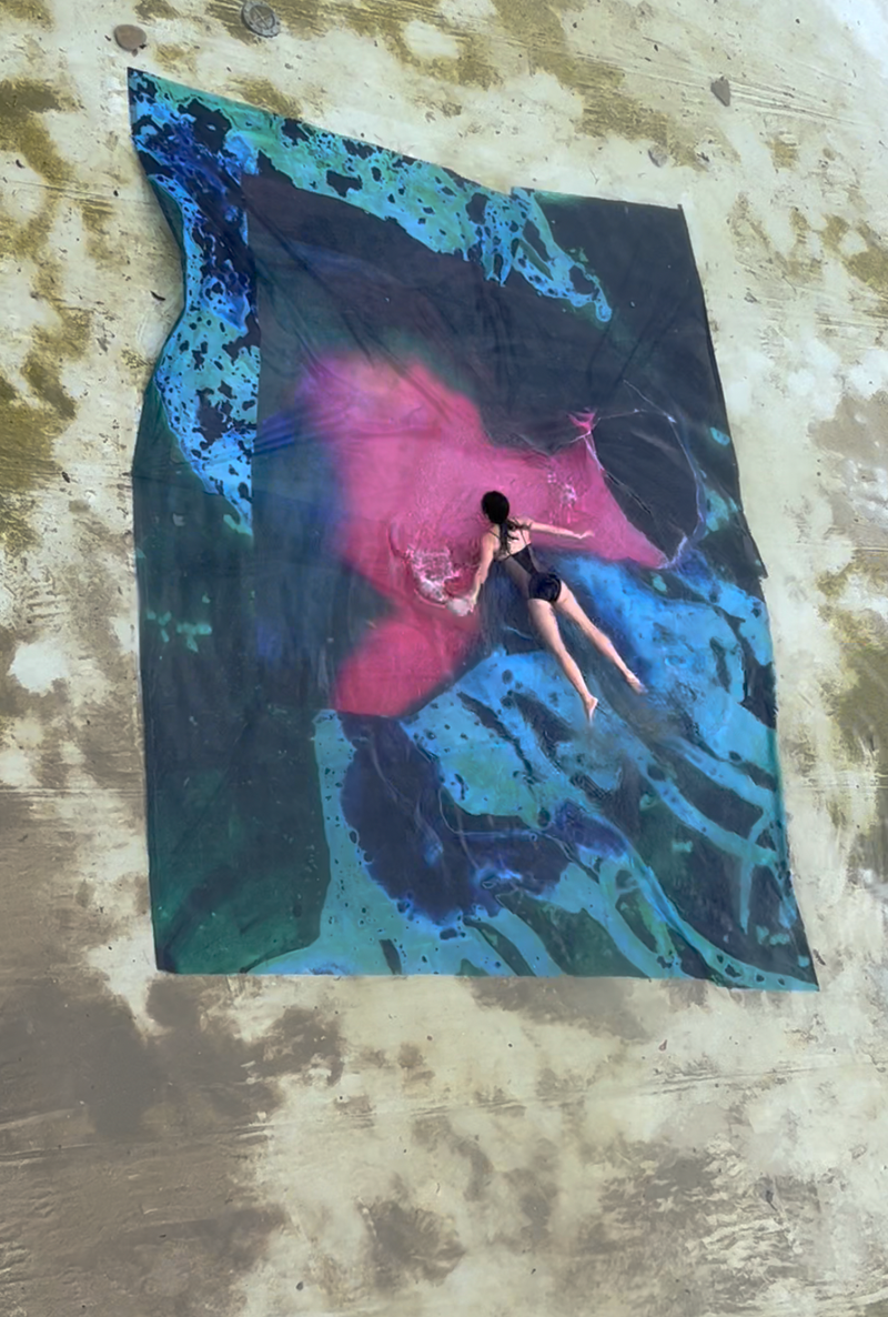 Artist Ana Vallejo swimming in her exhibition at Cassero LGBTI+ Club for PhMuseum Days 2022 © Ana Vallejo / PhMuseum