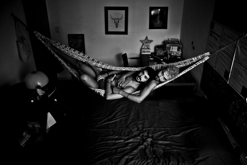 © Jetmir Idrizi. A gay couple from Sao Paolo, Brazil posing for a picture in their apartment.