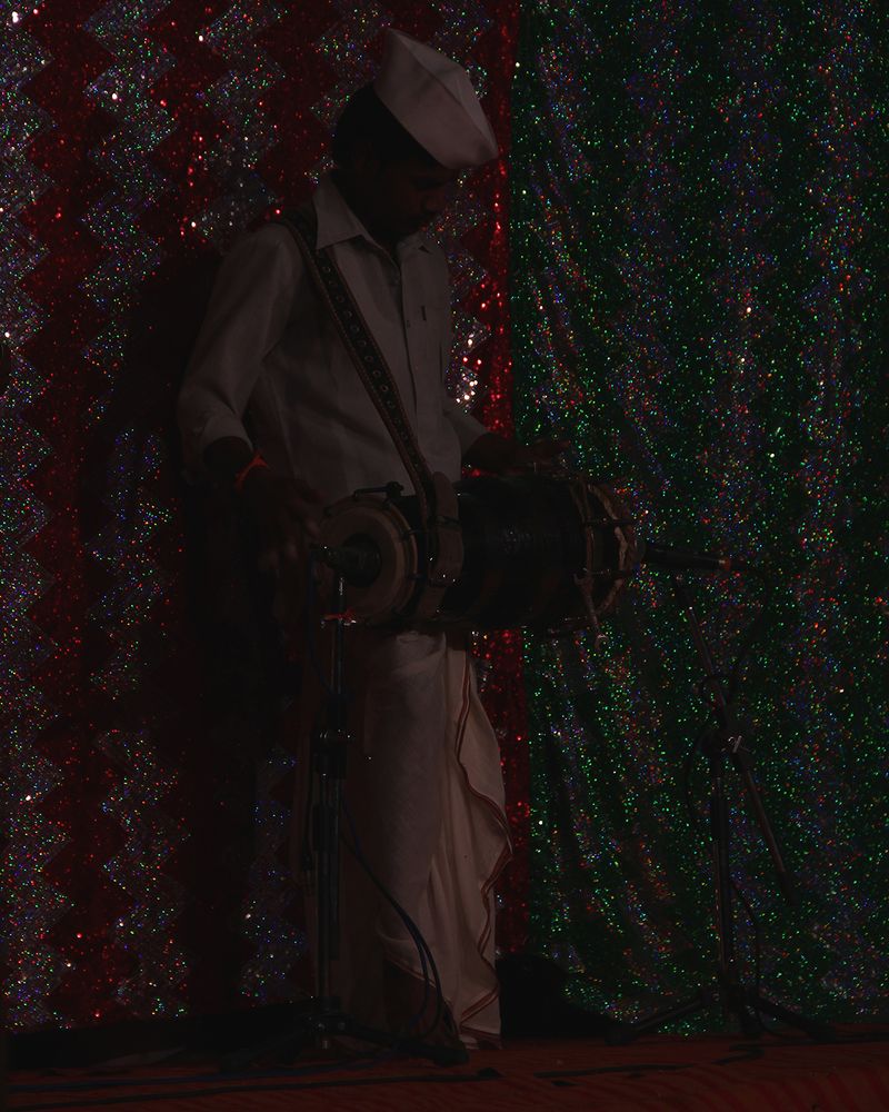 The Incessant Performance of a 100-Person Family