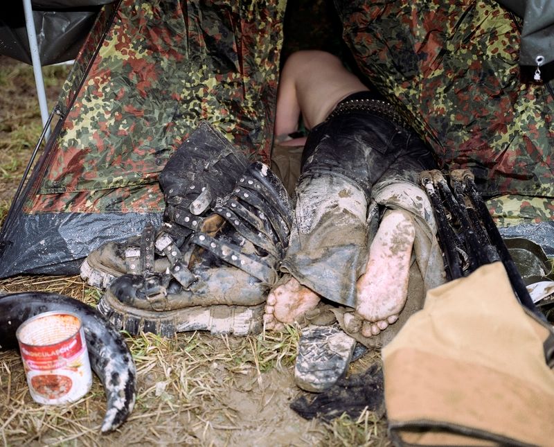 © Jörg Brüggemann - Metal fan slepps in his tent at the Summer Night Open Air in Mining, Austria, July 2009