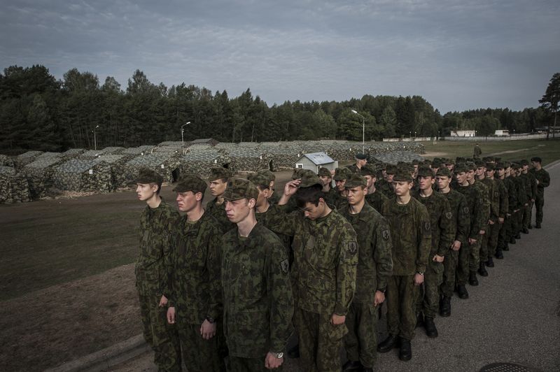 © Mattia Vacca - Young cadets get ready to march at dawn, inside the military camp in Rukla.