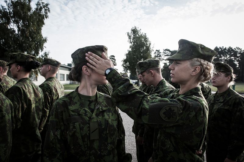 © Mattia Vacca - Two soldiers inspect each other's uniform before the first official parade at the military base in Rukla.