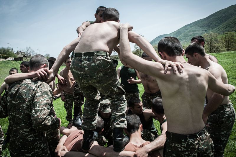 © Mattia Vacca - Young soldiers play in the Hadrut region just a few miles from the border with Iran.