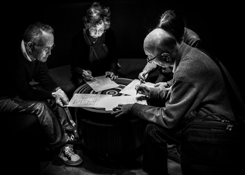 © Simona Bonanno - Passengers playing sudoku during the navigation. At sea 2017.