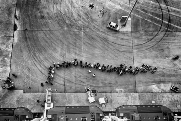 © Simona Bonanno - People in the line to get on board after the excursion at Olympia greek temples. Katakolo, Greece, 2015