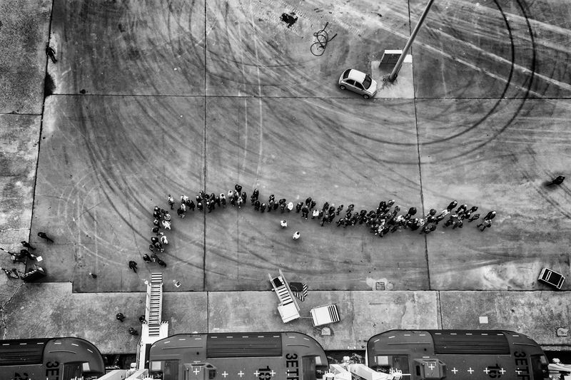 © Simona Bonanno - People in the line to get on board after the excursion at Olympia greek temples. Katakolo, Greece, 2015