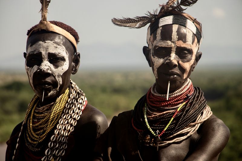 © Nwando Ebeledike - This photo was taken in Omo Valley, Ethiopia and is a photo of sister-wives married to the same man