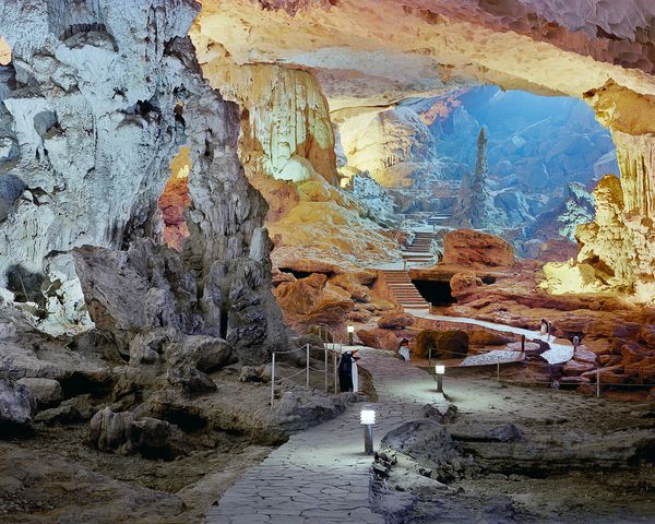© Austin Irving - Interior with Penguin Trash Cans, Dau Go Cave, Halong Bay, Vietnam, 2009