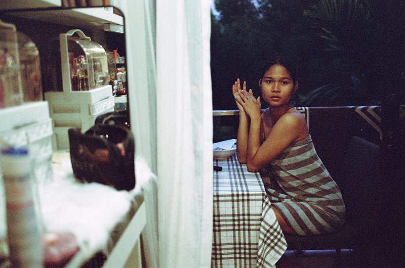 © Elizabeth Waterman - Chrissy in her apartment, getting ready for another night's work