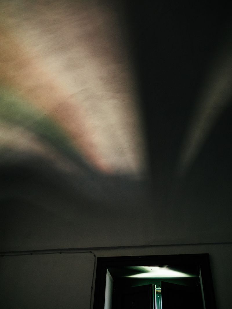 © Nikola Saev - Light playing in the ceiling of our room, afternoon