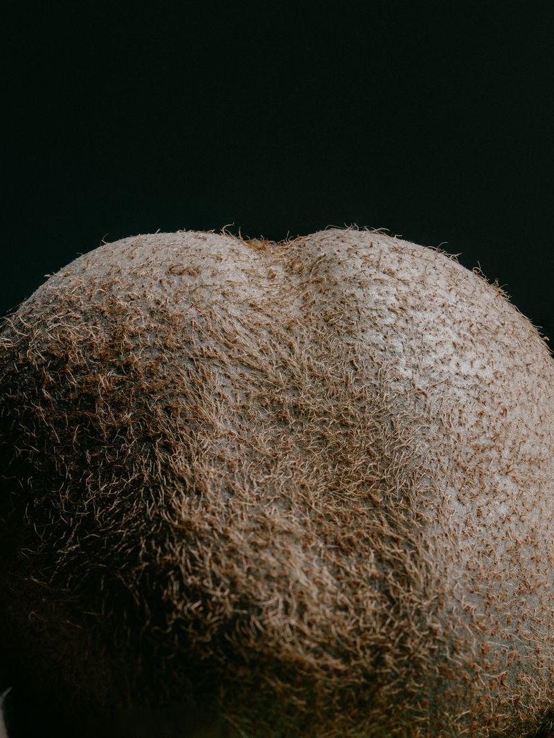© Nikola Saev - A kiwi in a fruit basket