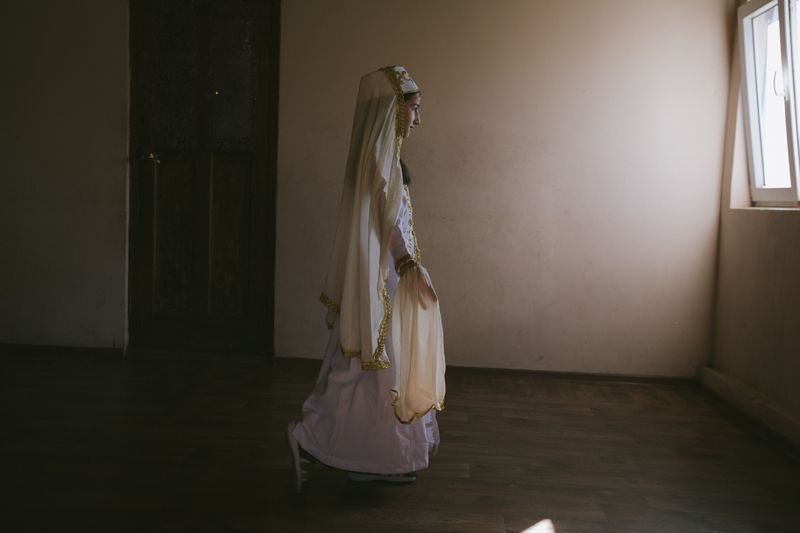 © Natalya Madilyan - A girl in an Abkhaz village wearing national dancing clothes