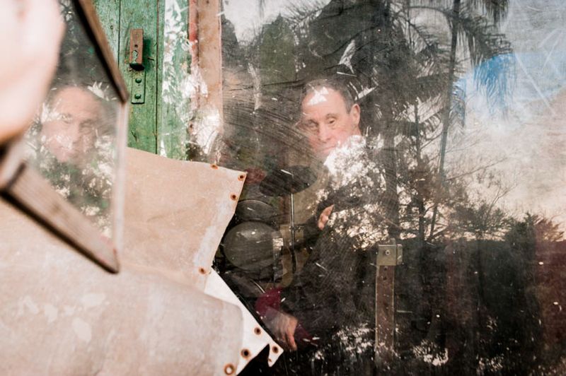 © Ilana Bar - I photograph Tio Carlão while he is on the drums, with my left hand I hold a mirror and duplicate Carlão's face.