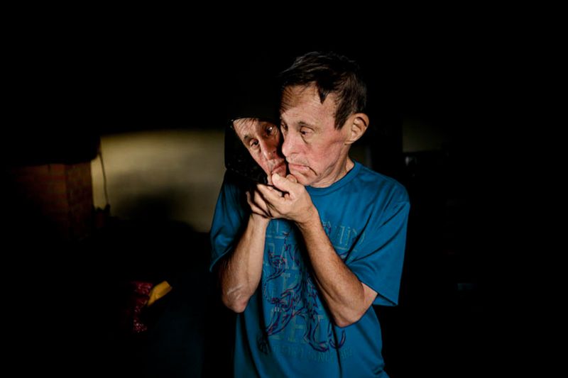 © Ilana Bar - The photo is posed, I asked Uncle Toninho to hold the mirror, his attitude is spontaneous.