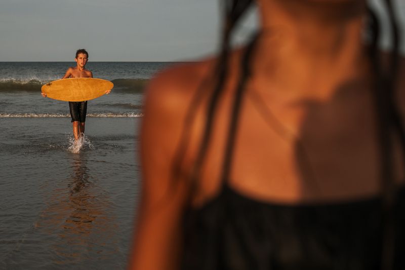 © Angela Ramsey - Jay is practicing his skim boarding skills.