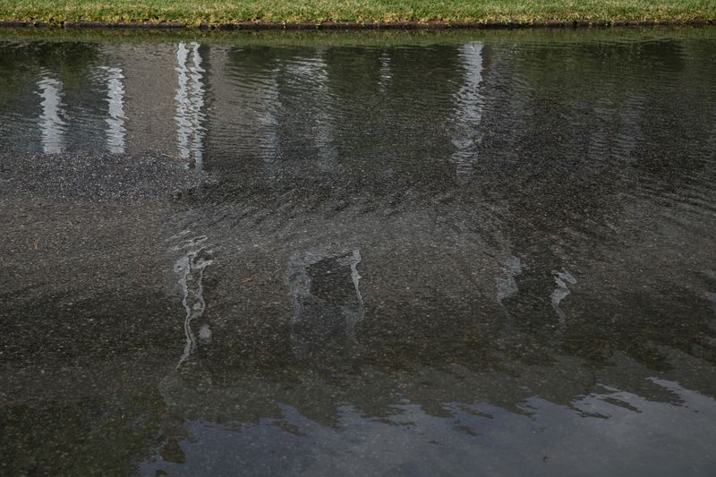 © Angela Ramsey - Streets become mini streams during " Sunny Day Flooding. " These occur during high tides and not an abnormal weather event.
