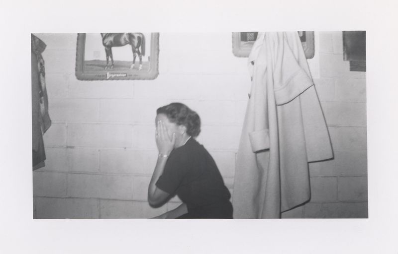 © Odette England - Image from the Woman Wearing Ring Shields Face from Flash photography project