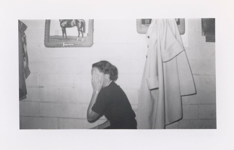 © Odette England - Image from the Woman Wearing Ring Shields Face from Flash photography project