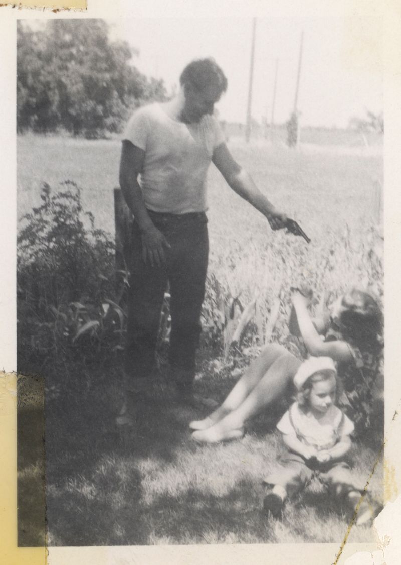 © Odette England - Image from the Woman Wearing Ring Shields Face from Flash photography project