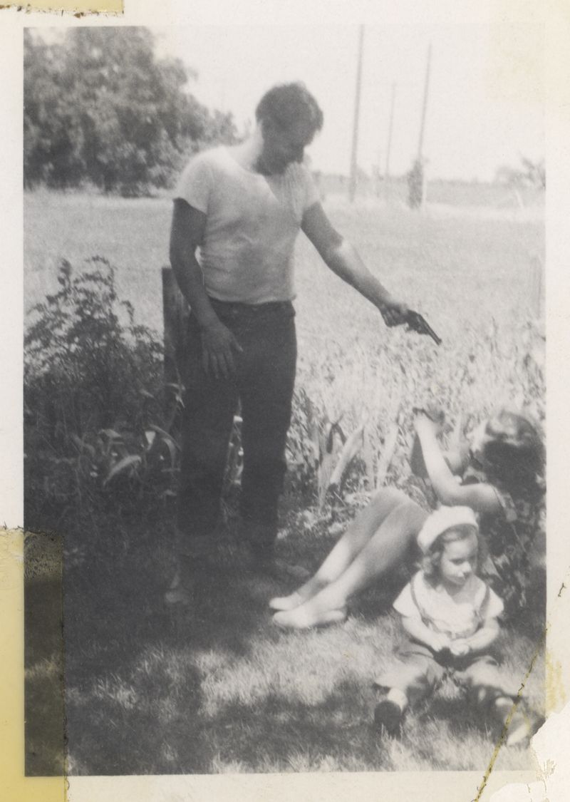 © Odette England - Image from the Woman Wearing Ring Shields Face from Flash photography project