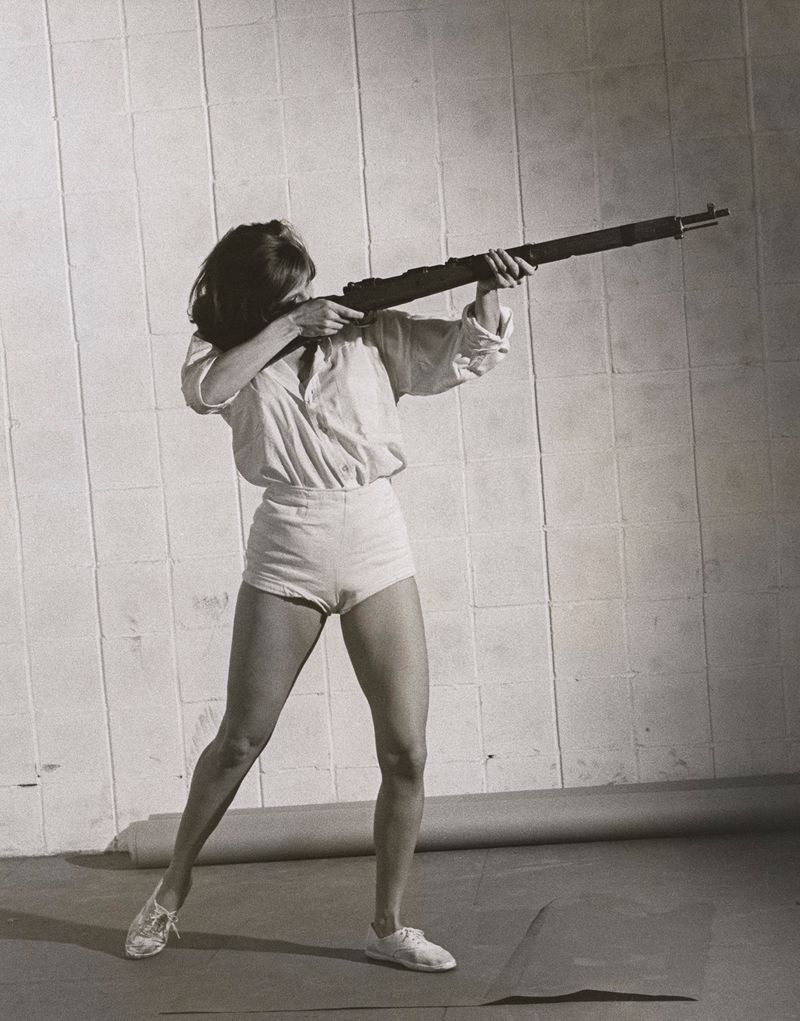 © Odette England - Image from the Woman Wearing Ring Shields Face from Flash photography project