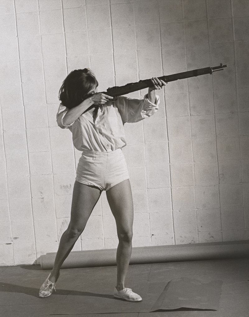 © Odette England - Image from the Woman Wearing Ring Shields Face from Flash photography project