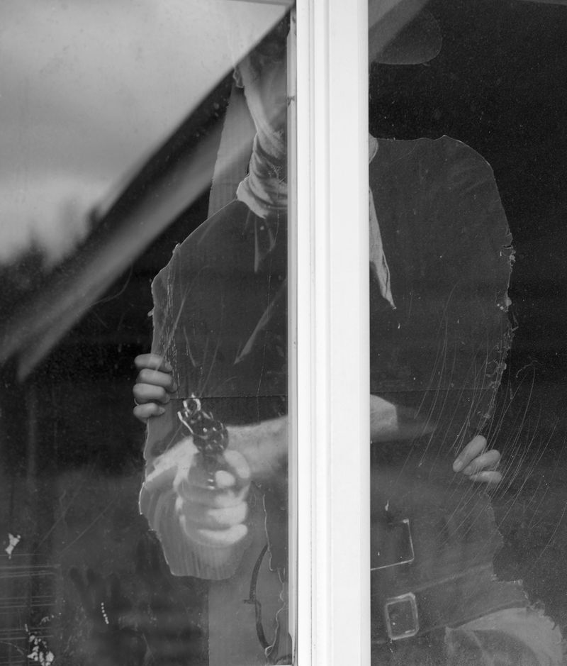 © Odette England - Image from the Woman Wearing Ring Shields Face from Flash photography project