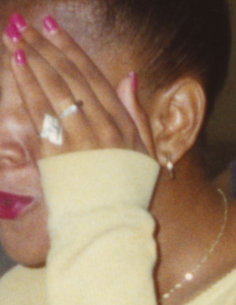 © Odette England - Image from the Woman Wearing Ring Shields Face from Flash photography project