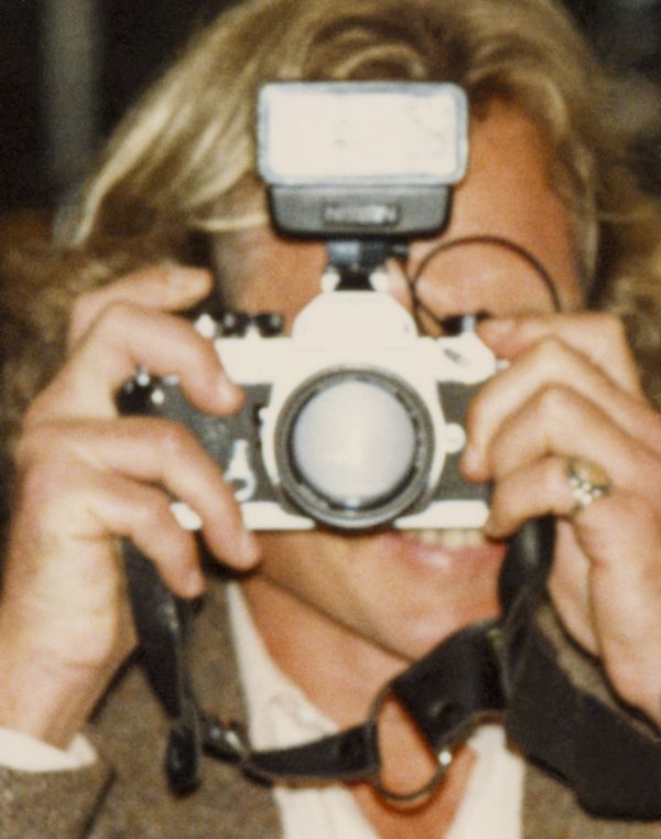 © Odette England - Image from the Woman Wearing Ring Shields Face from Flash photography project