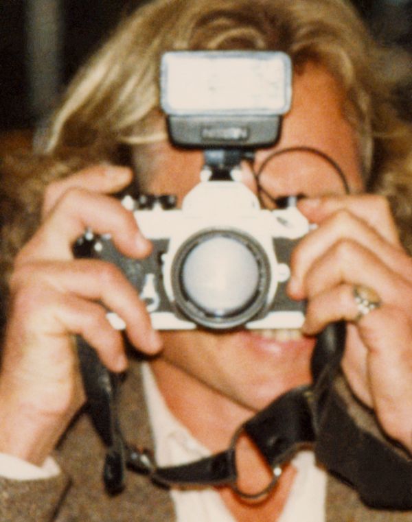 © Odette England - Image from the Woman Wearing Ring Shields Face from Flash photography project