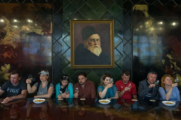 © Stanislava Novgorodtseva - Tasting of wine during the excursion to the factory of champagne. Novy Svet village