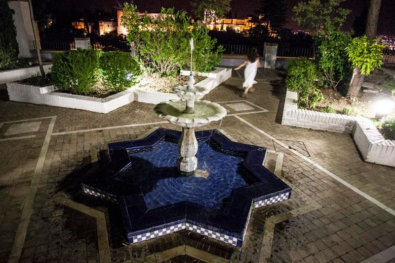 © Chiara Ferronato - A girl running in the courtuyard of Granada’s Major Mosque.