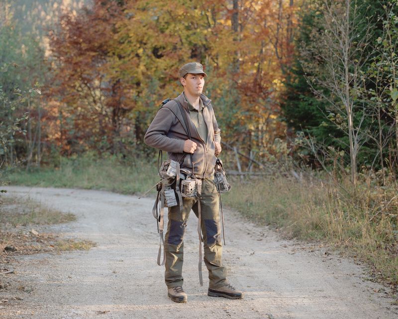 © Nicholas J.R. White - David collecting camera traps beside Pecineagu Lake [October, 2018]