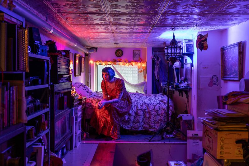 © Elisa Maenhout - Amy Rose Performing a Small Ritual on Her Nightstand, New York City, NY, USA, 2025